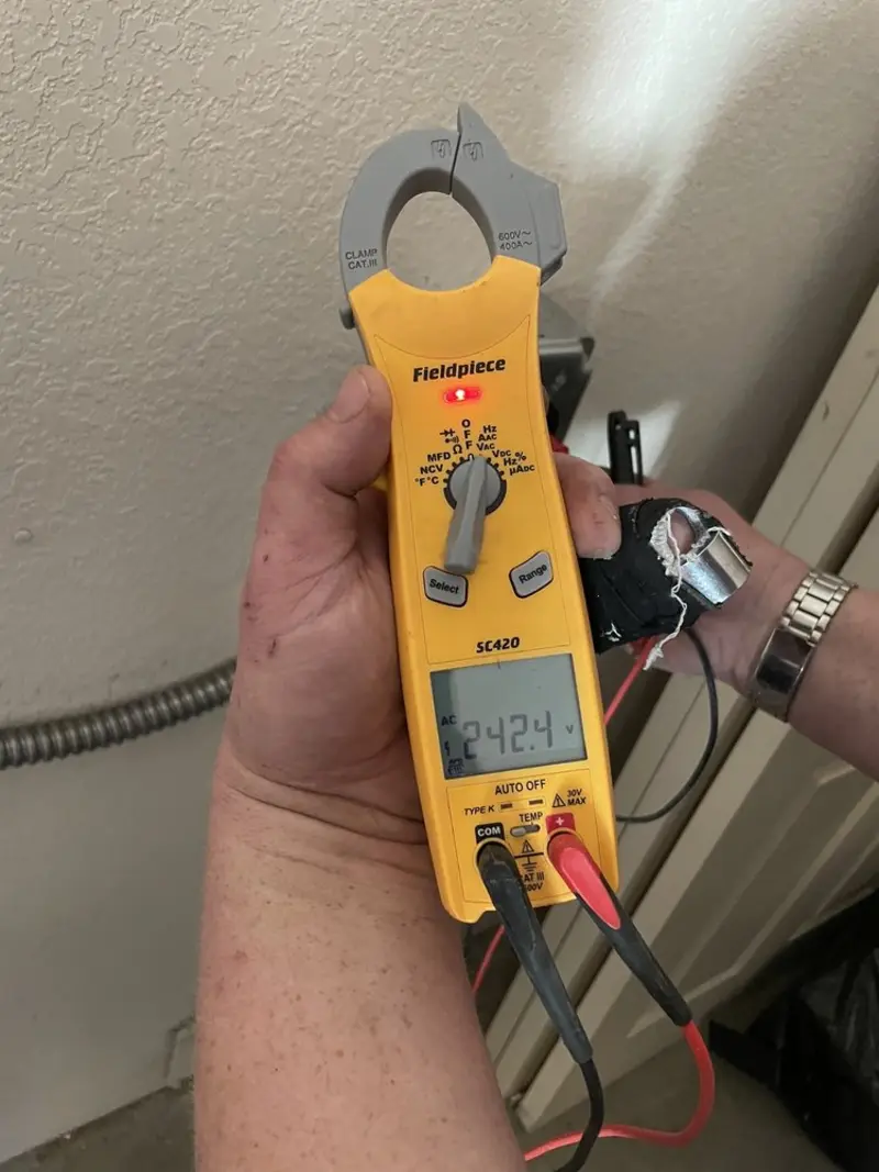 Voltage testing with clamp meter during Hot Tub / Pool Electrical Wiring in Ellicott